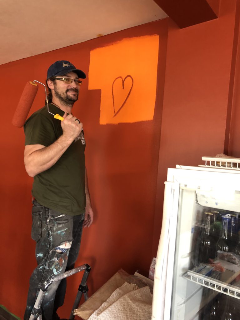 Roger painting a wall we had already painted but changed our minds about the colour.